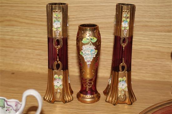 A Venetian ruby and gilt-painted liqueur set with a pair of matching vases and tray